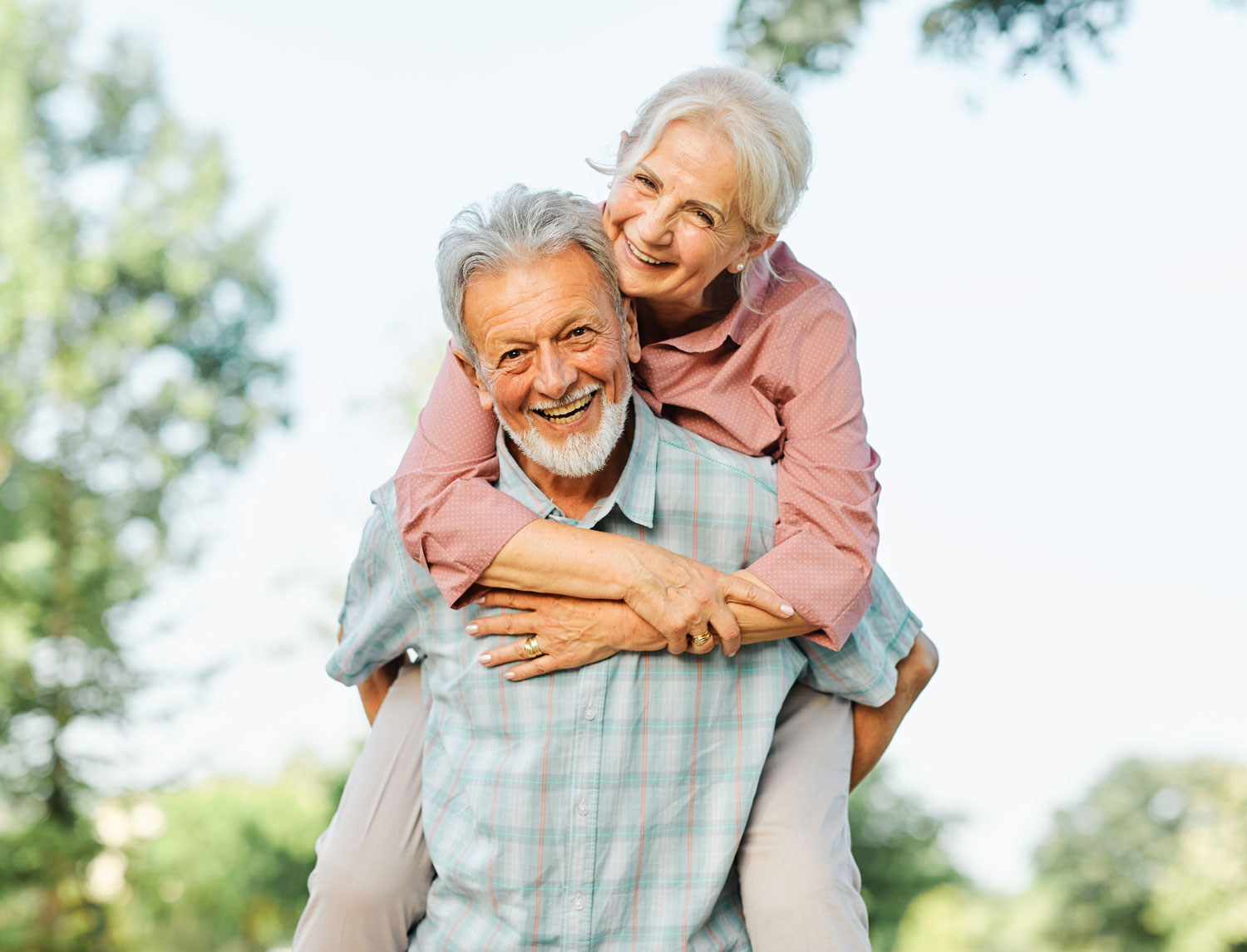 Happy senior couple outside