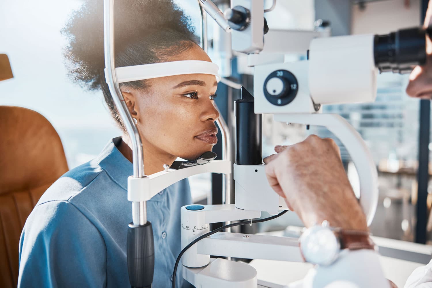 Woman having her eyes examined