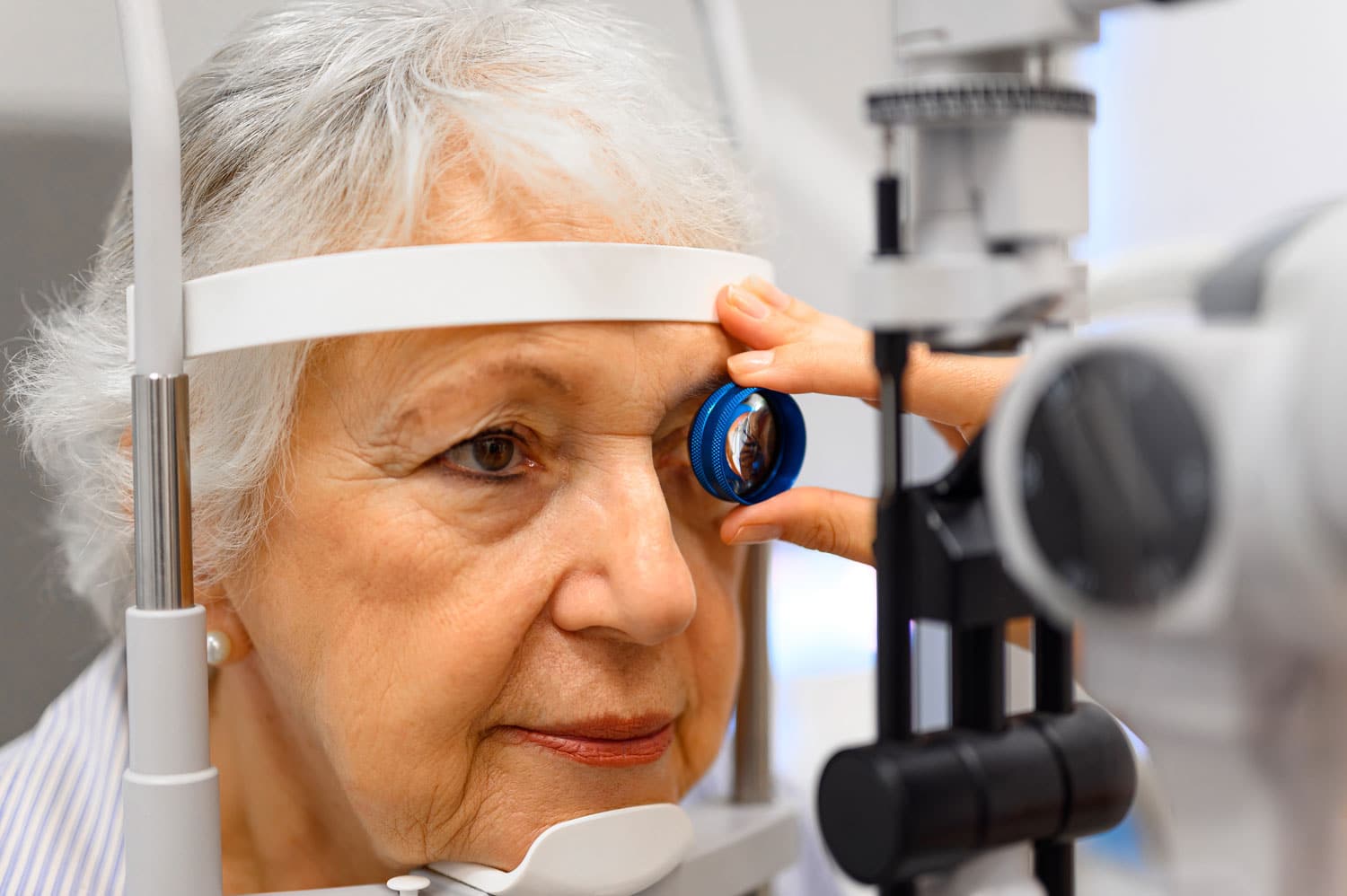 Woman having her eyes examined